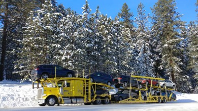 : Our truck transporting multiple SUVs