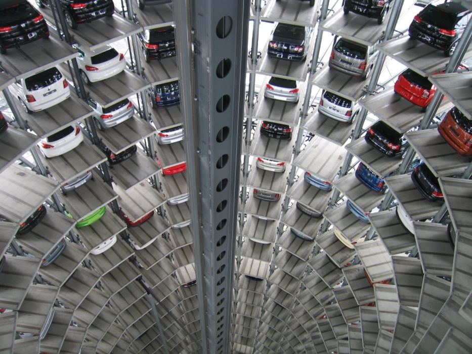 Different cars parked in a multistory parking lot